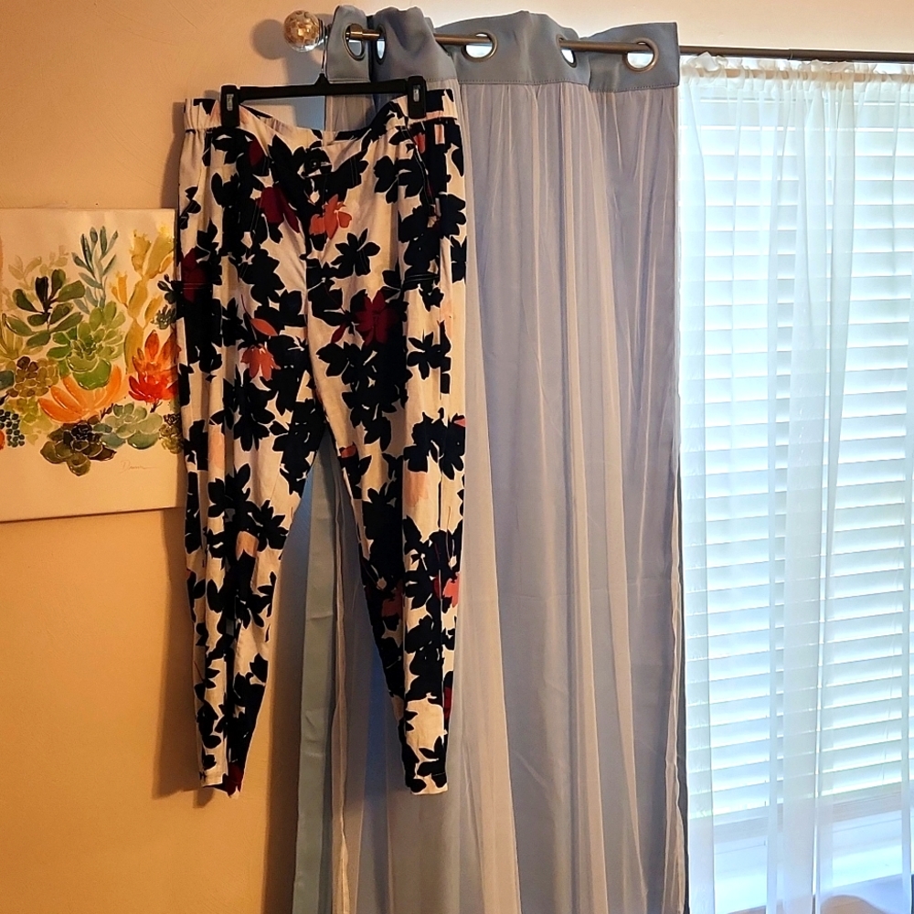 One pant set by Liz Claiborne, pant size L and sweater size XXL for $17.